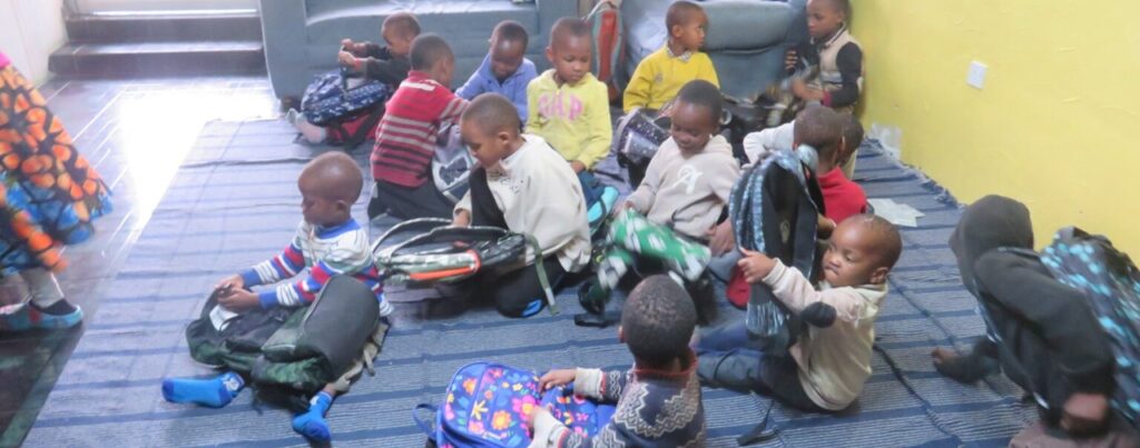 Parentless children in Arusha get new schoolbacks donated from Denmark